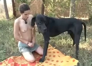 Wild brunette is playing with a hound